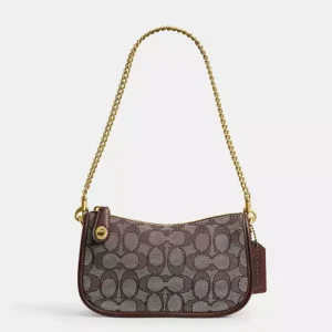 Bolsa Coach Swinger 23 signature