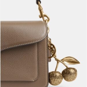 Chaveiro Coach Cherry dourado