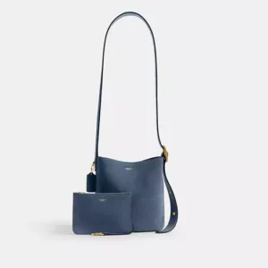 Bolsa Coach Bleecker 21 suede