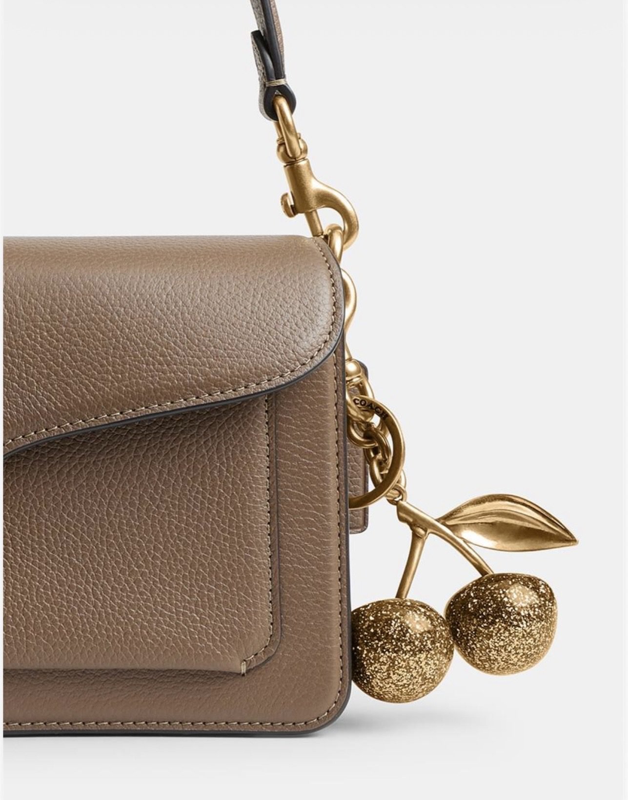 Chaveiro Coach Cherry dourado
