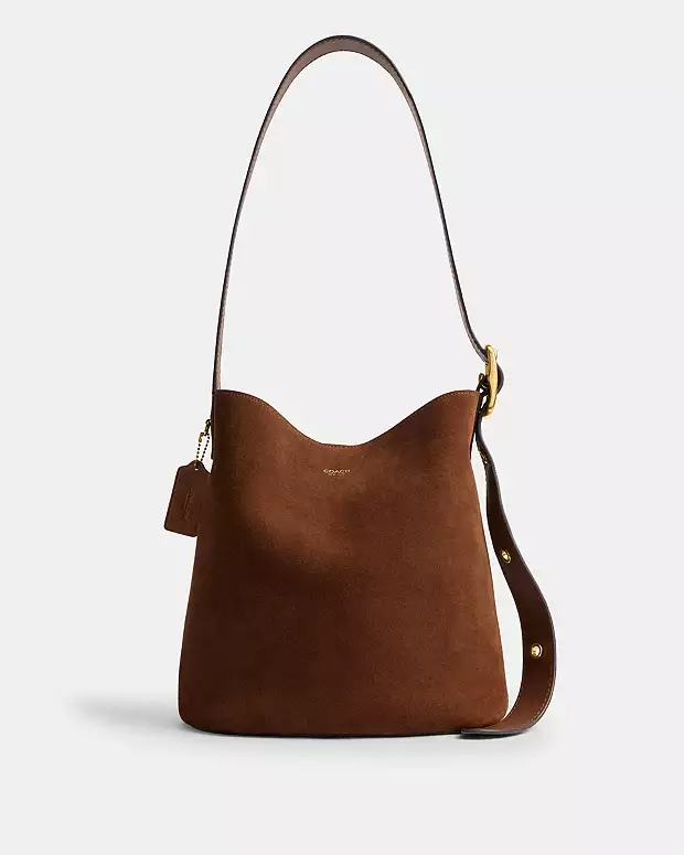 Bolsa Coach Bleecker suede marrom