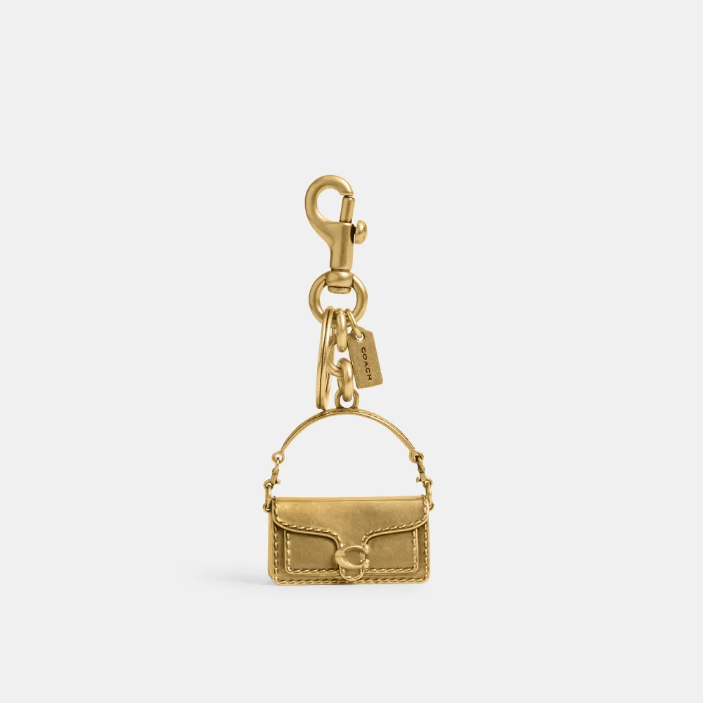 Chaveiro Tabby Coach dourado