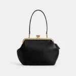 Bolsa Coach Kisslock 27 preta