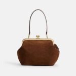 Bolsa Coach Kisslock 27 suede