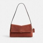 Bolsa Coach Chelsea 30 suede clay