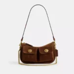 Bolsa Coach Turnlock Waverly suede