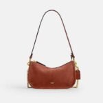 Bolsa Coach Waverly suede clay