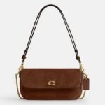 Bolsa Coach Brook flap suede marrom