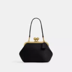 Bolsa Coach Kisslock Frame 16 preta