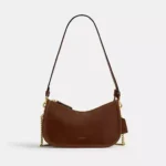 Bolsa Coach Waverly suede marrom