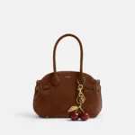 Bolsa Coach Empire 21 suede marrom