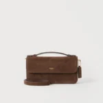 Bolsa Coach Elora suede dark